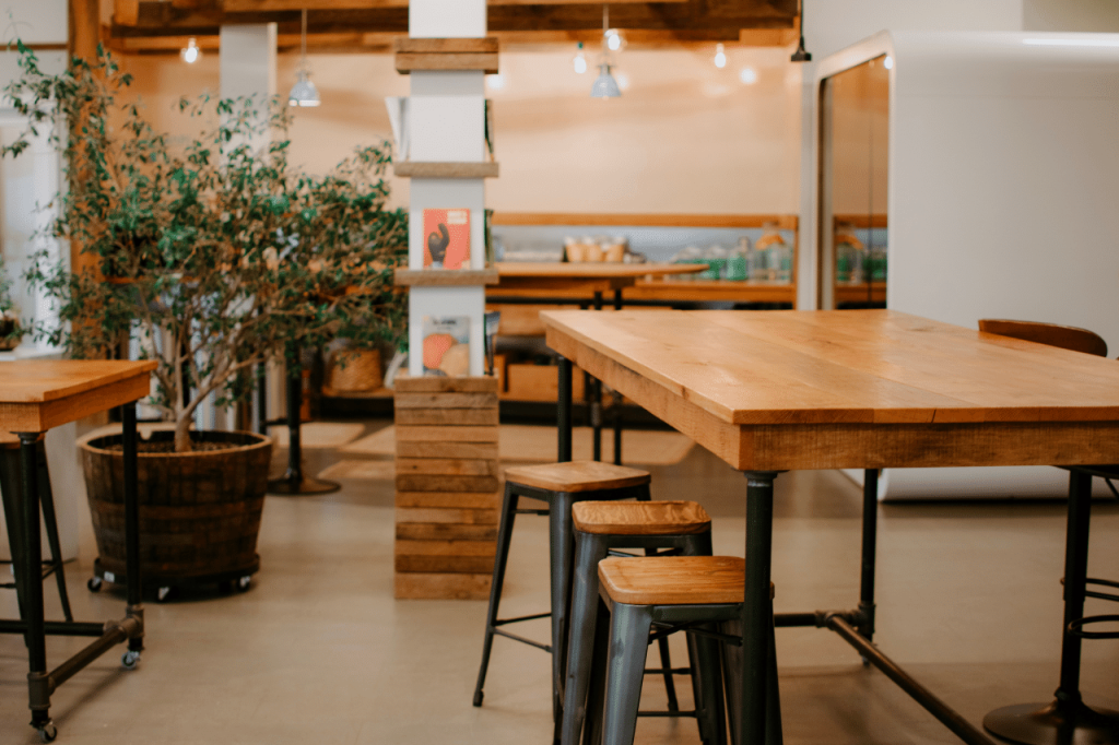 office interior with plants and kitchen area