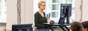 office worker working on a standing desk