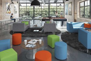 students chilling in communical college or school areas with colourful sofas and low chairs