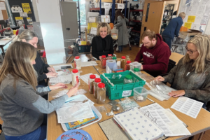team supplies web volunteering helping a foodbank